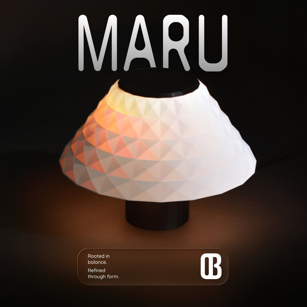 Maru, frosted white, table lamp, nature inspired lamp, lighting, table lamp. A 3D printed table lamp. textured lamp, compact table lamp, small table lamp, ambient light. glow lamp, ribbed texture lamp, faceted lamp, sand dunes inspired lamp, round lamp, bedside lamp, table lamp, night lamp, white lamp, warm white lamp, designer lamp.