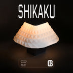 Shikaku Frosted white, table lamp, Geometry inspired lamp, lighting, table lamp. 3d printed table lamp. textured lamp, compact table lamp, small table lamp, ambient light. glow lamp, ribbed texture lamp, architecture, lamp, Geometrically inspired lamp, round lamp, bedside lamp, table lamp, night lamp, white lamp, warm white lamp, designer lamp.