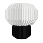 Transparent fluted ambient lamp with soft diffused glow and sculptural ribbed design.